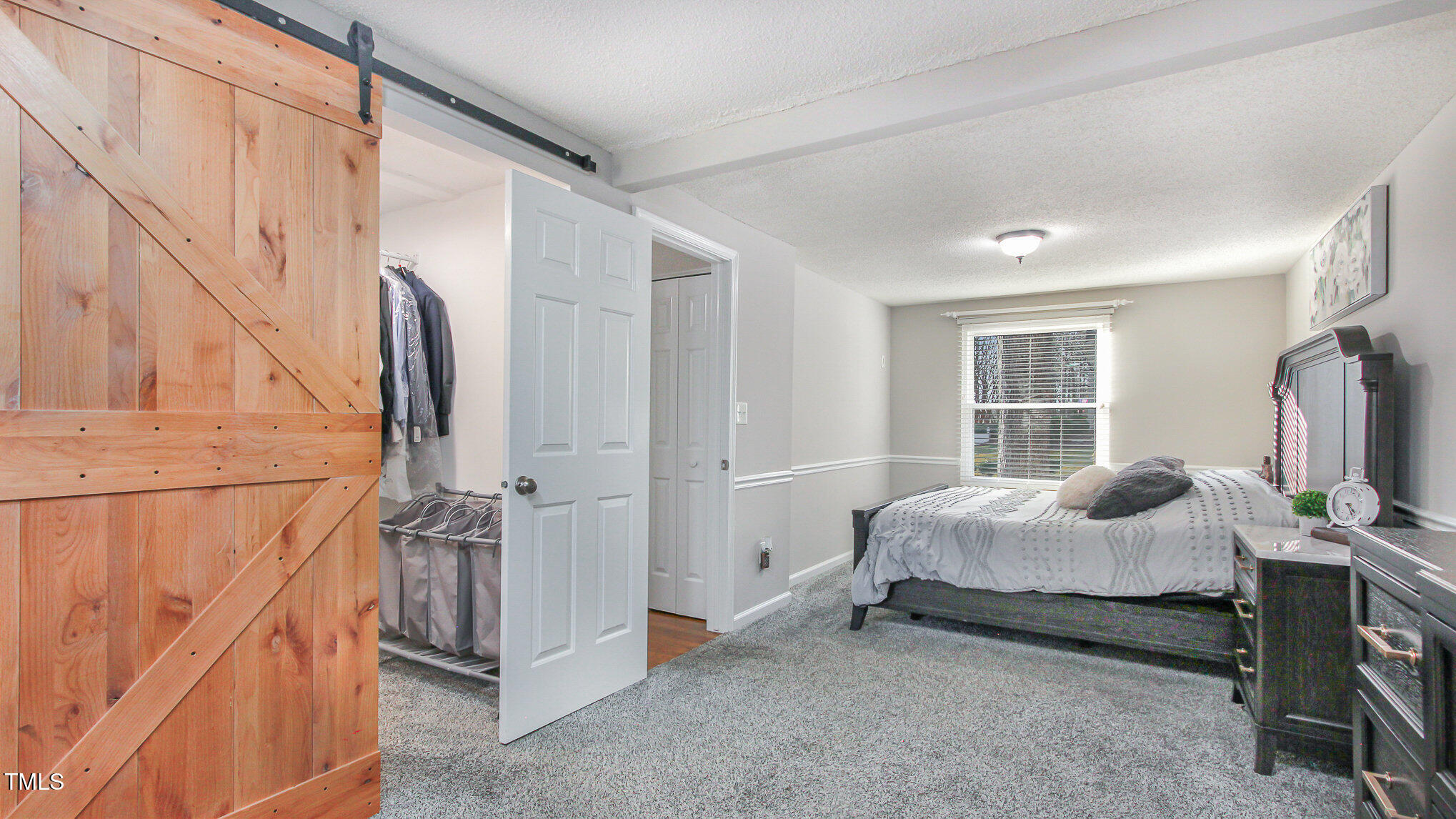 918 Templeridge Road Wake Forest, NC 27587 - Photo 5 of 12 a bed room with a bed and a television