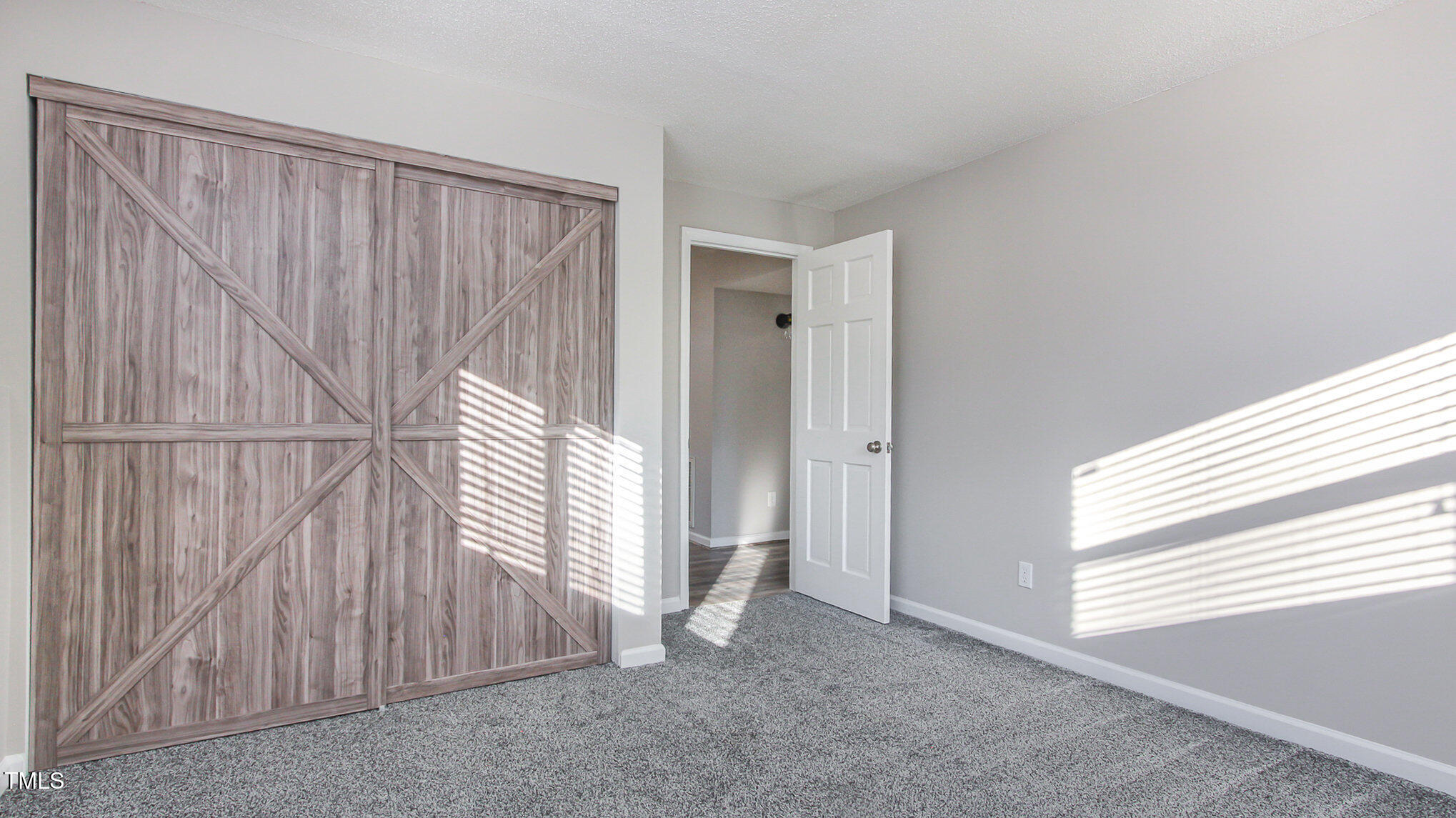 918 Templeridge Road Wake Forest, NC 27587 - Photo 9 of 12 a view of a room with a window and a ceiling fan