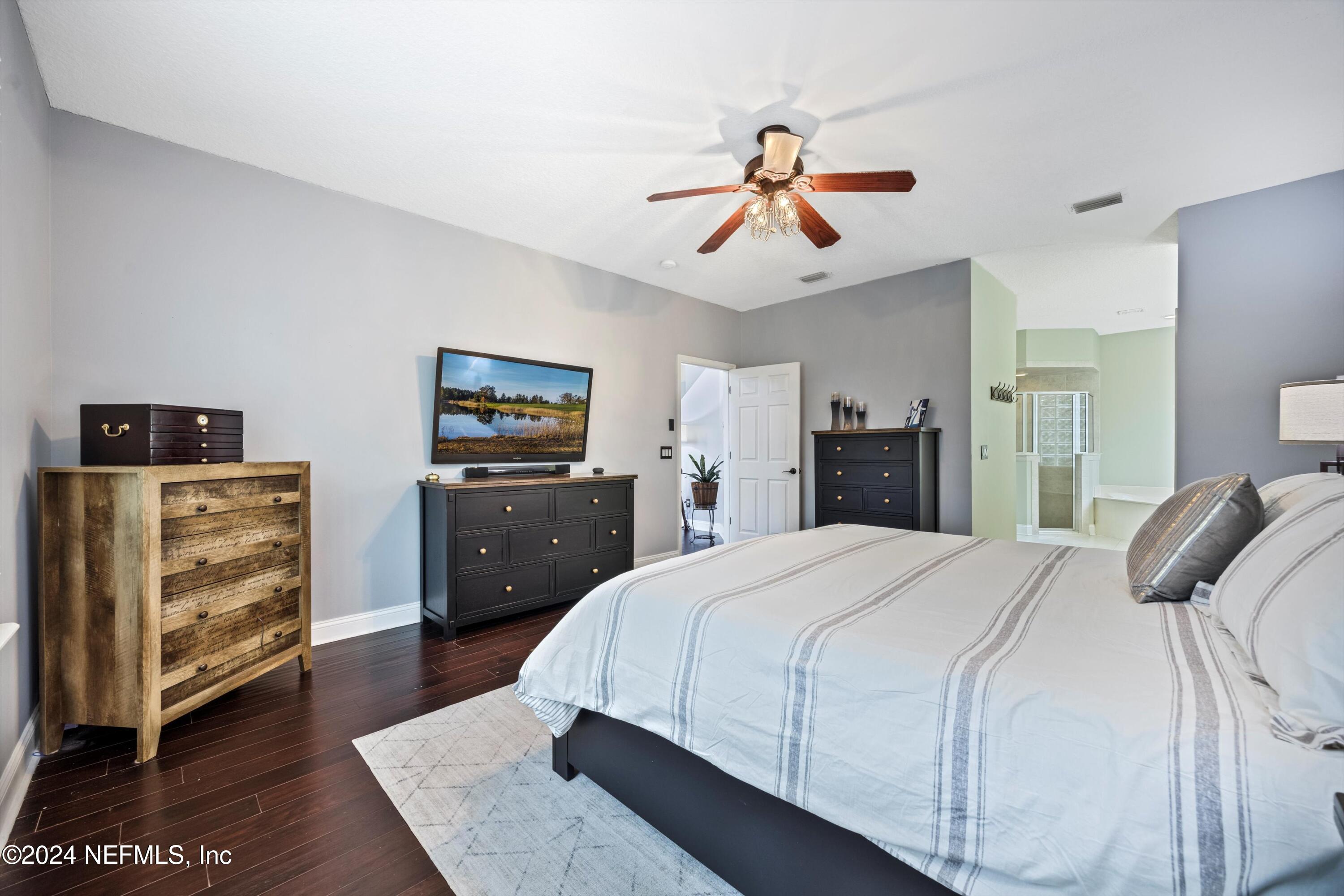 1843 South Landguard Road St. Augustine, FL 32092 - Photo 18 of 67 a bedroom with a bed and wooden floor