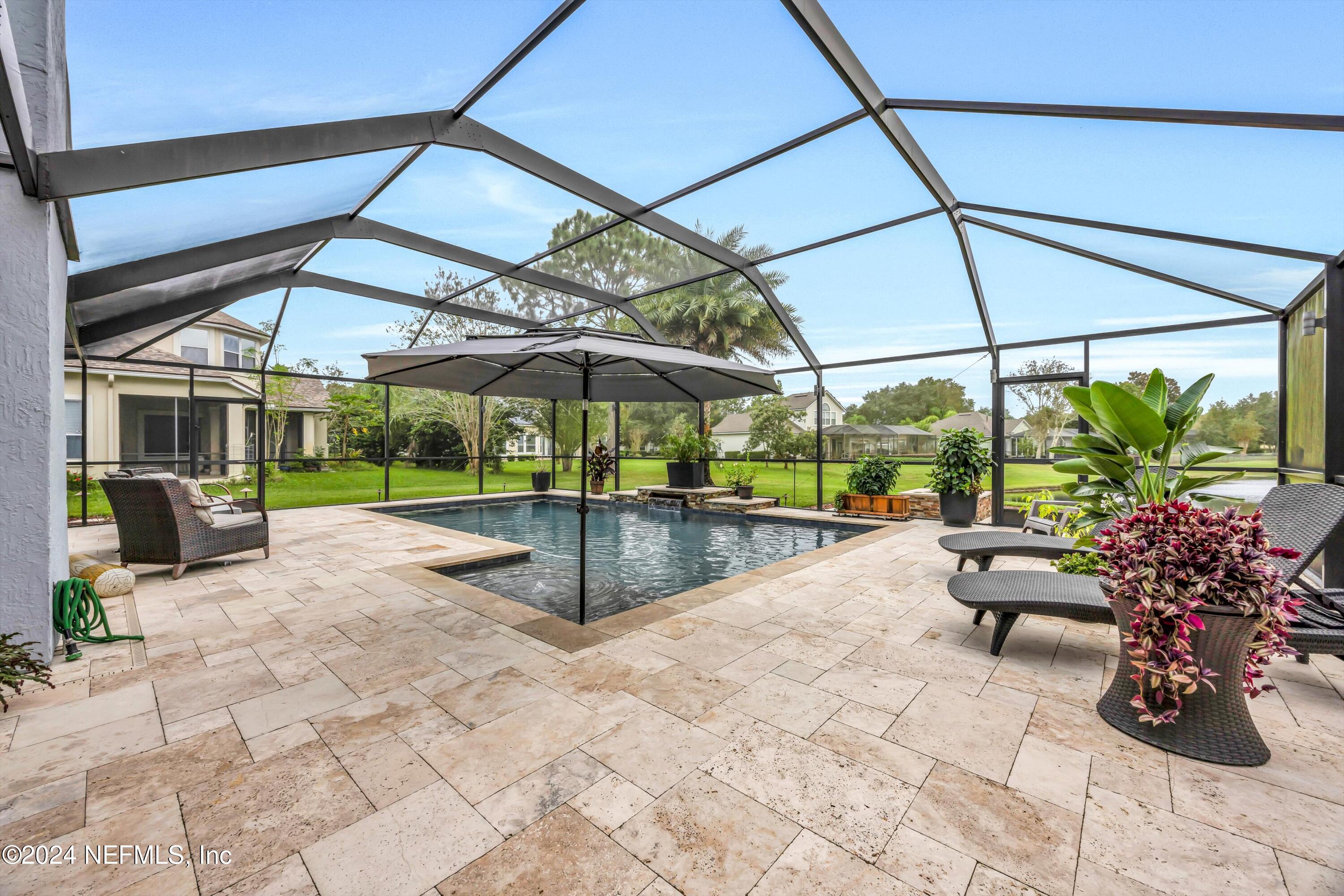 1843 South Landguard Road St. Augustine, FL 32092 - Photo 2 of 67 a view of swimming pool with sitting area