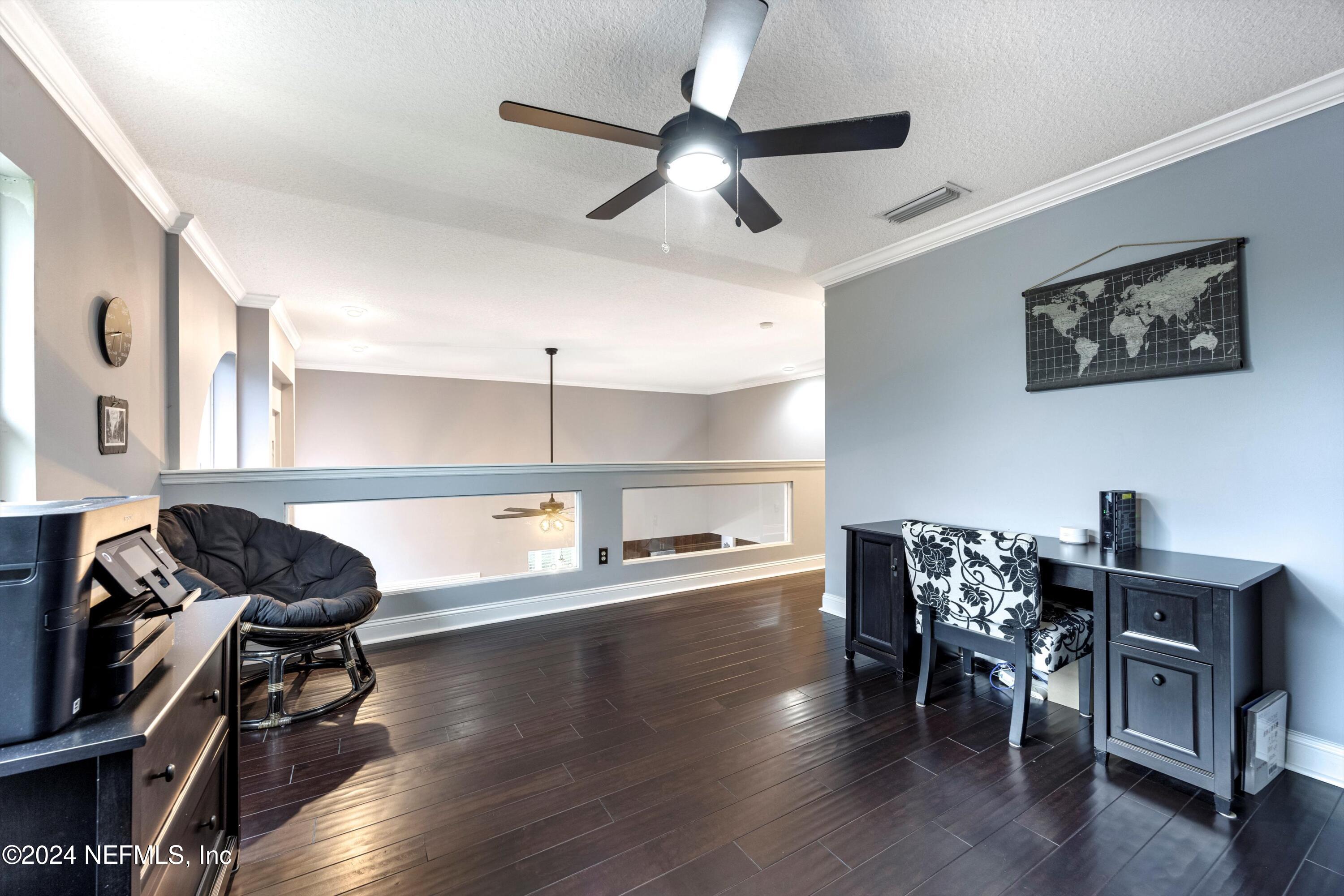 1843 South Landguard Road St. Augustine, FL 32092 - Photo 23 of 67 a workspace with wooden floor
