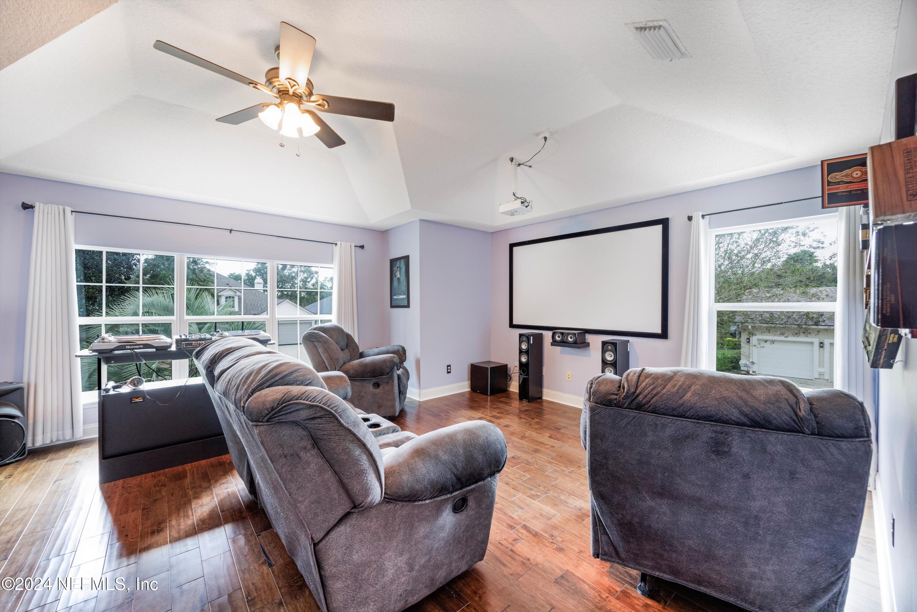 1843 South Landguard Road St. Augustine, FL 32092 - Photo 29 of 67 a living room with furniture and a large window