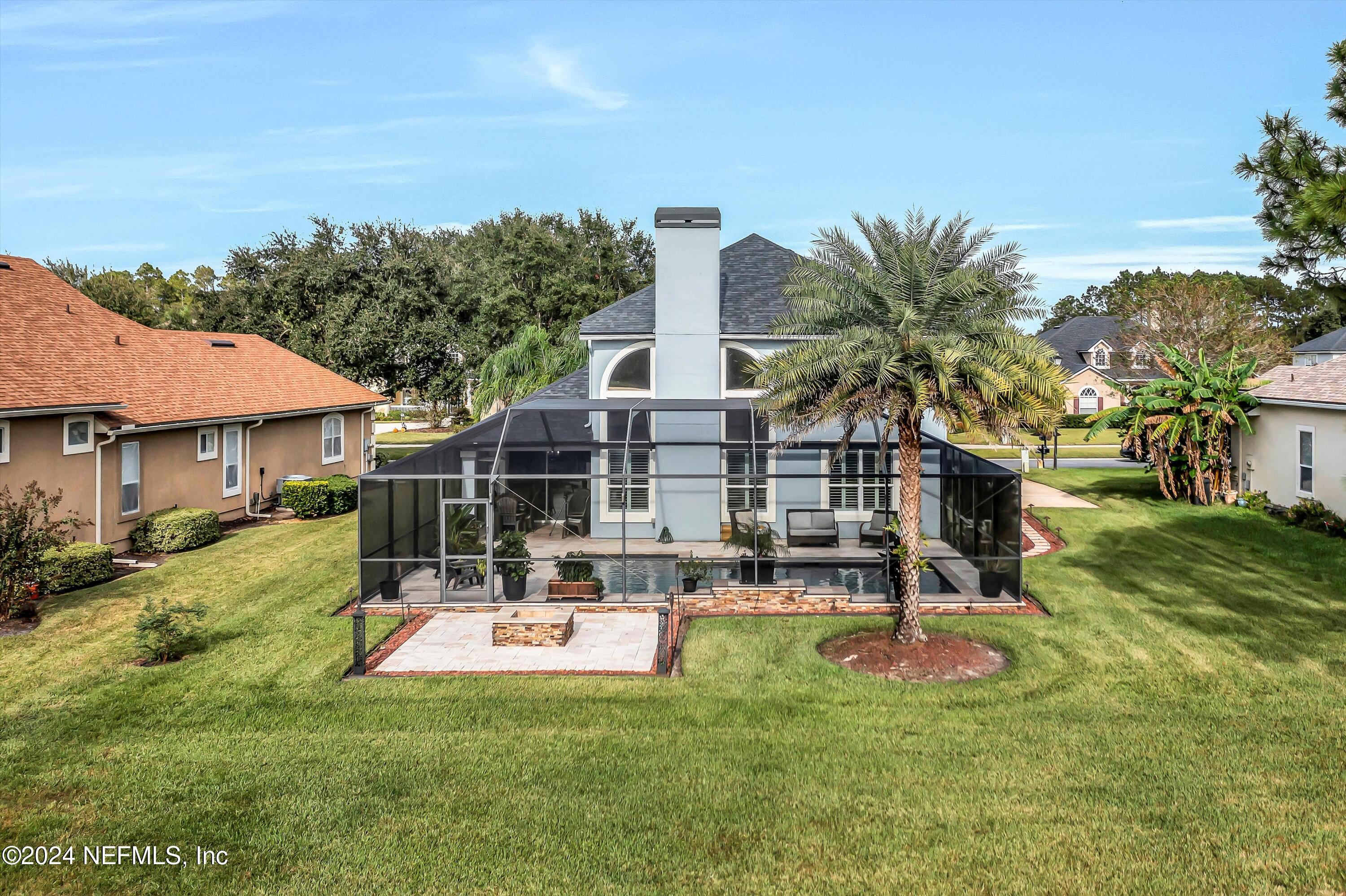 1843 South Landguard Road St. Augustine, FL 32092 - Photo 34 of 67 a view of a house with swimming pool and porch with furniture