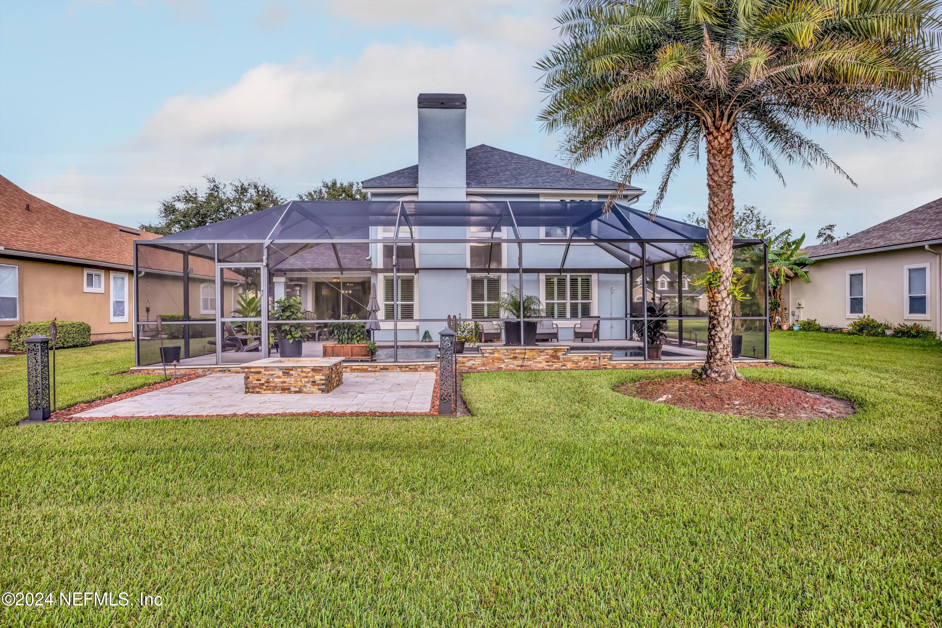 1843 South Landguard Road St. Augustine, FL 32092 - Photo 40 of 67 a view of a house with swimming pool and porch