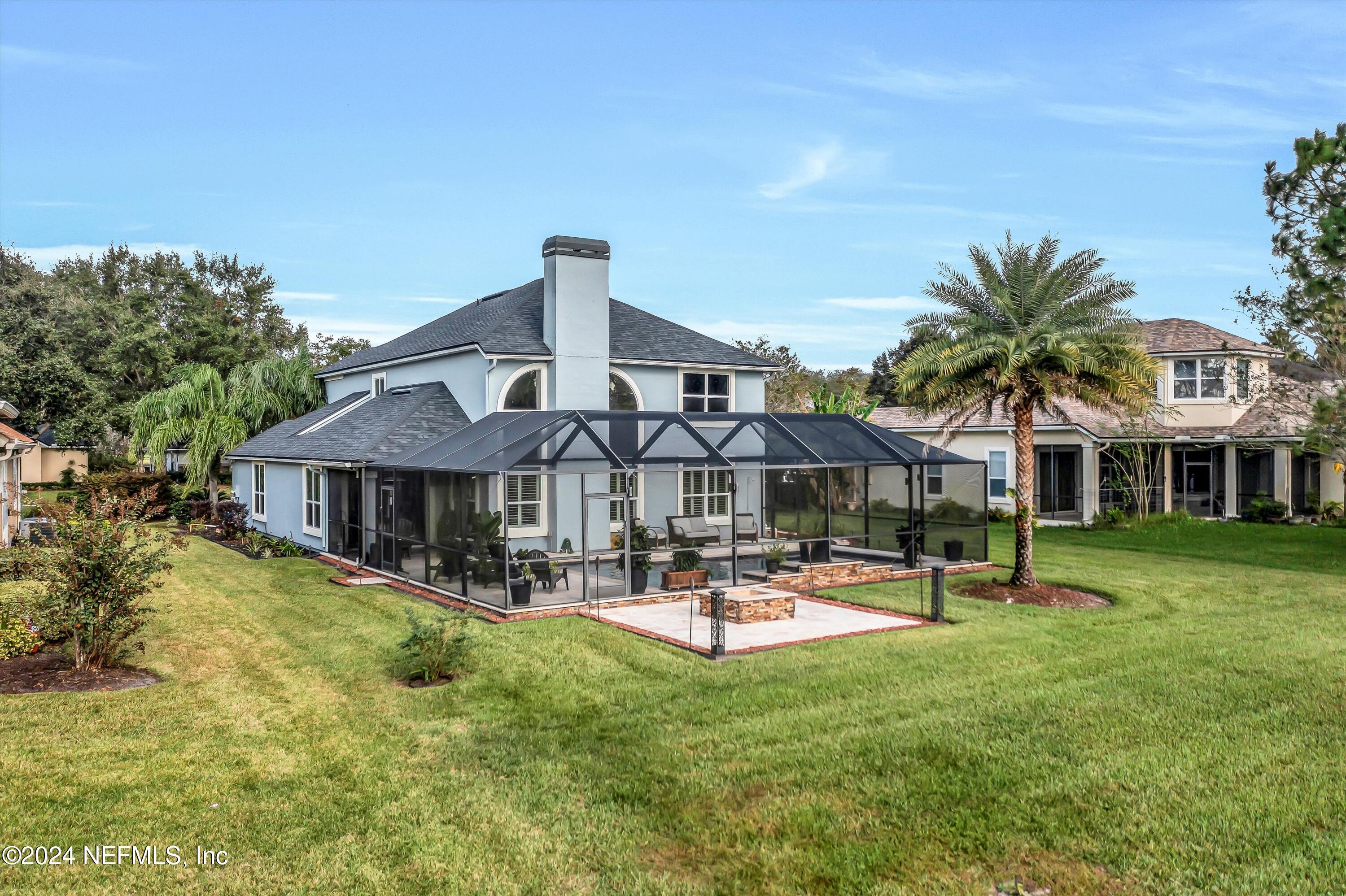 1843 South Landguard Road St. Augustine, FL 32092 - Photo 44 of 67 a front view of a house with a yard