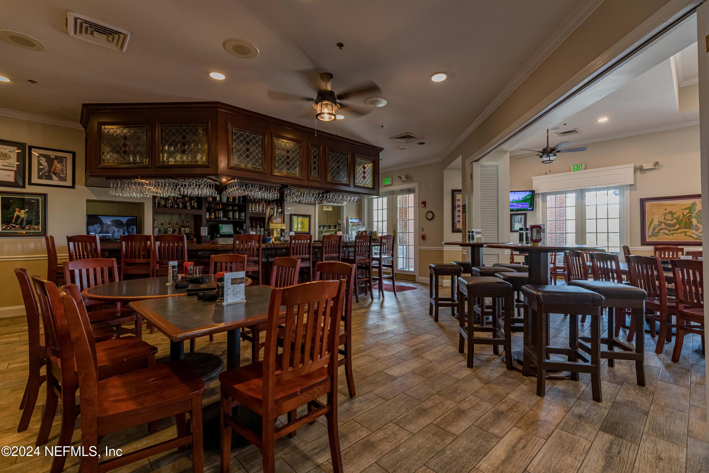 1843 South Landguard Road St. Augustine, FL 32092 - Photo 64 of 67 a view of a dining area with furniture and chandelier