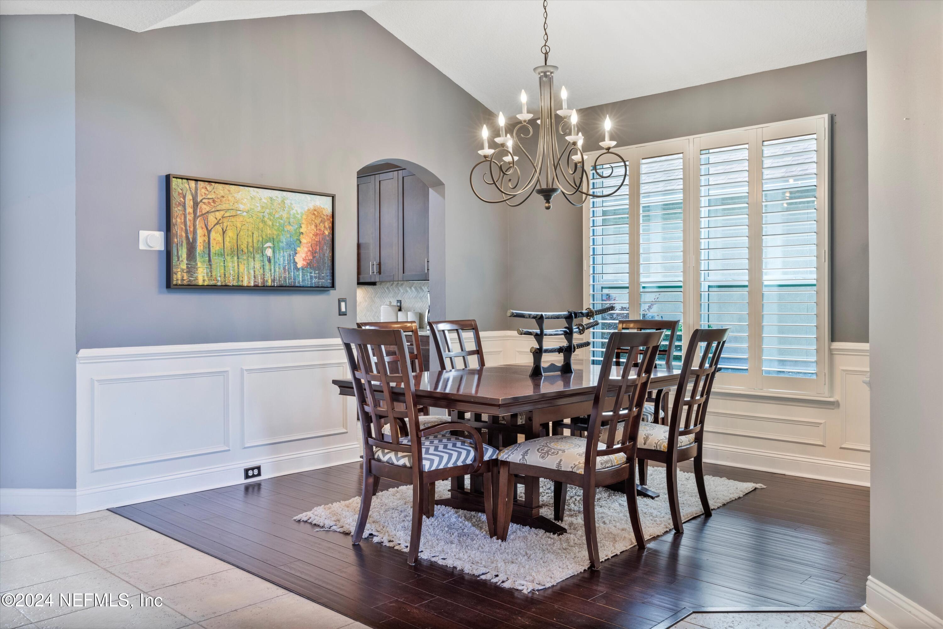1843 South Landguard Road St. Augustine, FL 32092 - Photo 8 of 67 a view of a dining room with furniture window and wooden floor