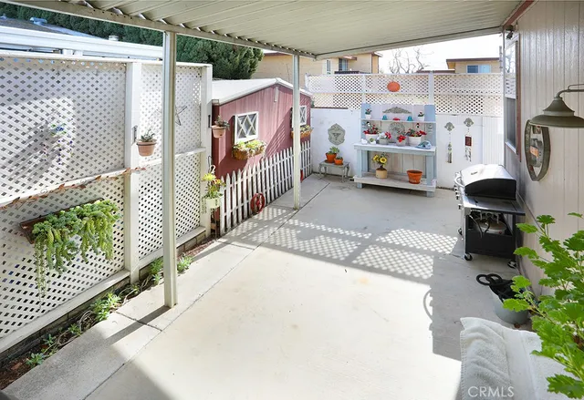 a view of a porch with furniture