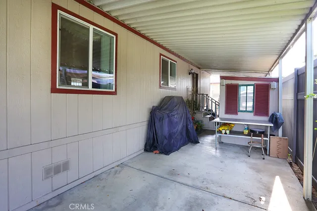 a workspace with furniture and window