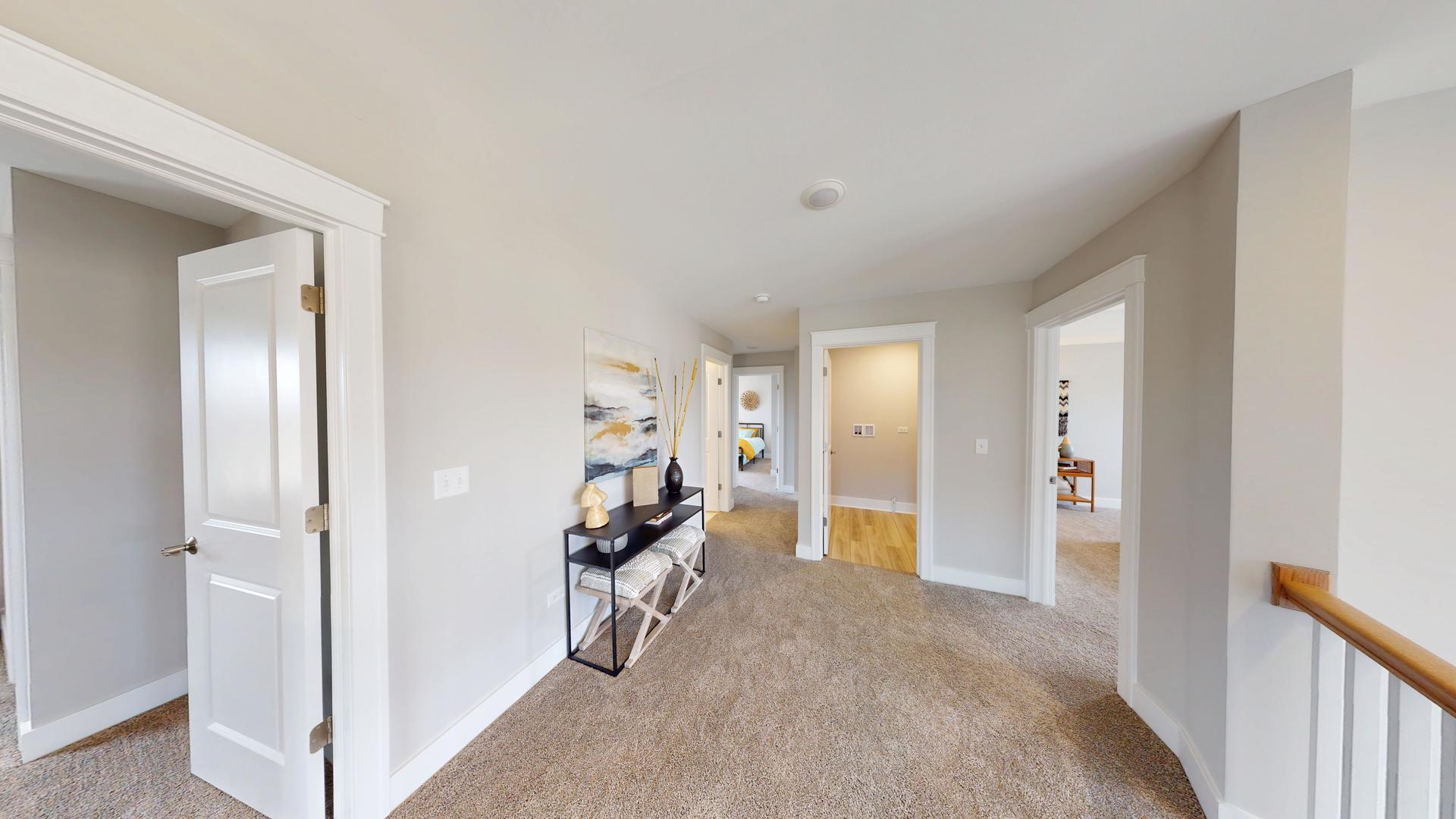 2 Deerpath Road North Aurora, IL 60542 - Photo 26 of 45 a view of a livingroom with furniture and white walls