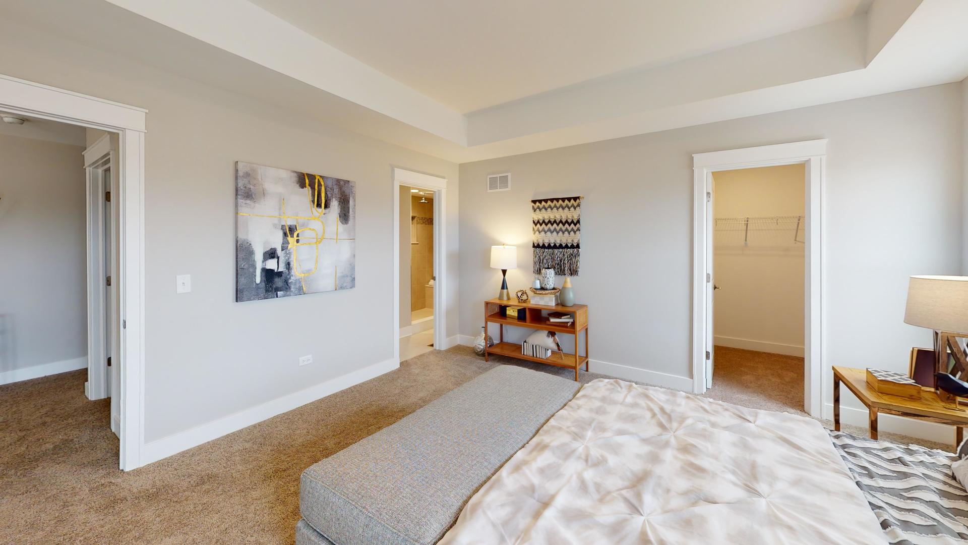 2 Deerpath Road North Aurora, IL 60542 - Photo 39 of 45 a bed room with a bed and a chair