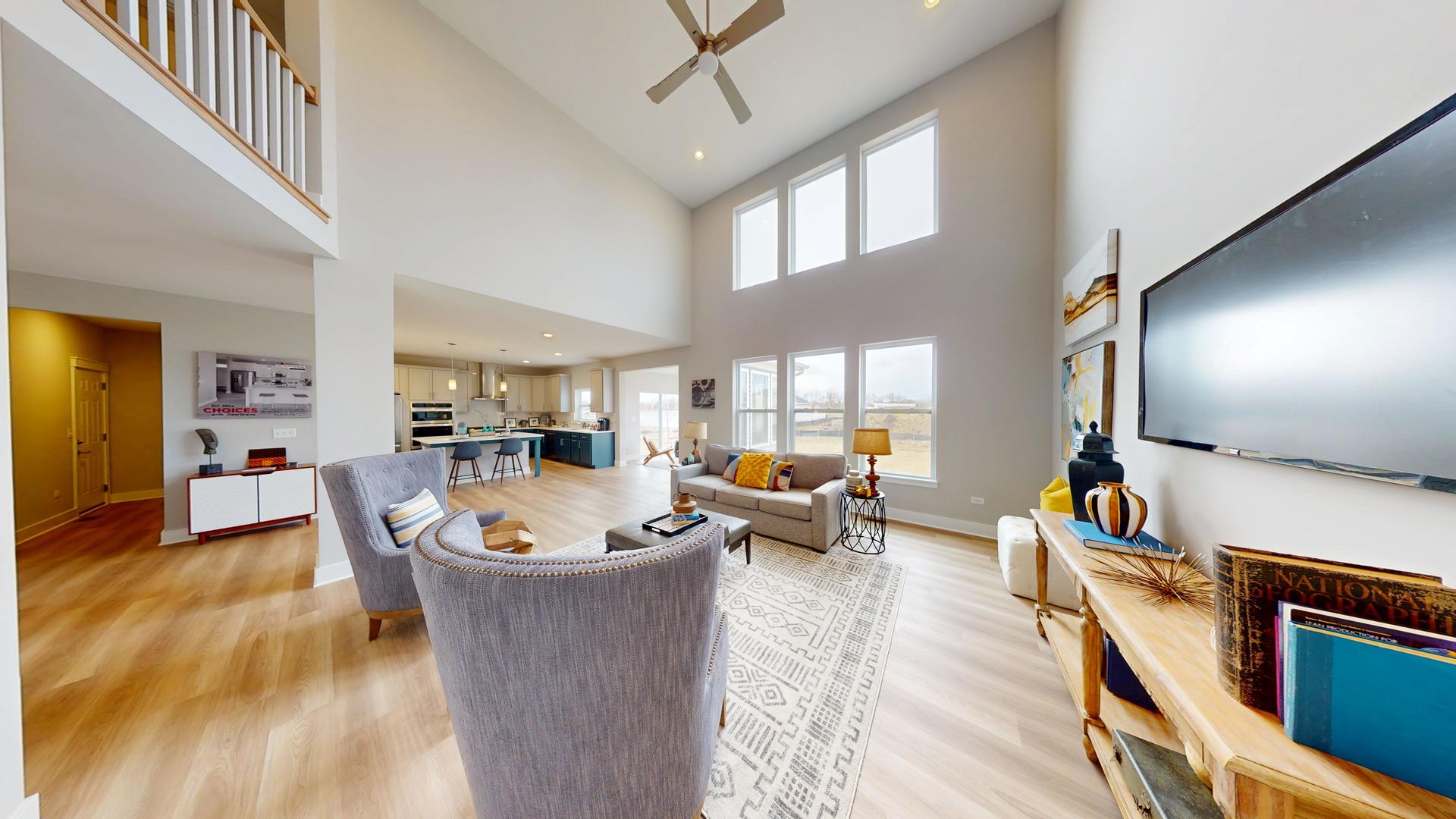 2 Deerpath Road North Aurora, IL 60542 - Photo 7 of 45 a living room with furniture and a flat screen tv