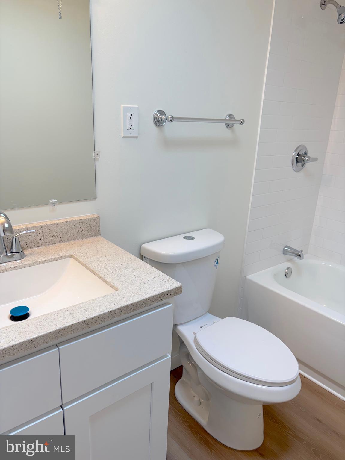 12157 Aster Road Philadelphia, PA 19154 - Photo 5 of 6 a bathroom with a sink a toilet and shower