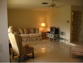 1776 North Dodge Melbourne, FL 32935 - Photo 2 of 6 a living room with furniture and a piano