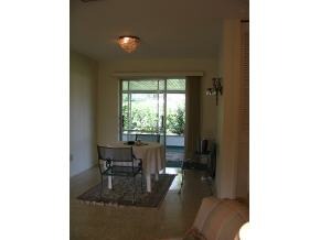 1776 North Dodge Melbourne, FL 32935 - Photo 5 of 6 a living room with furniture and a large window