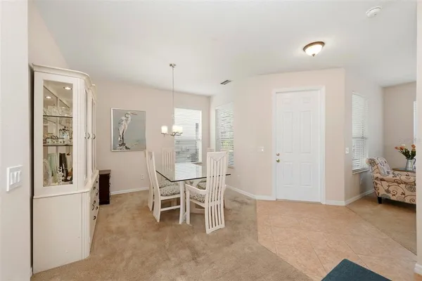 a view of a livingroom with furniture and windows