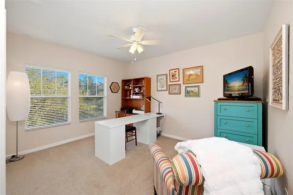 a bathroom with a double vanity sink toilet and shower