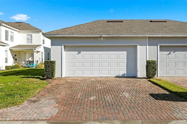 a view of a yard in front of a house