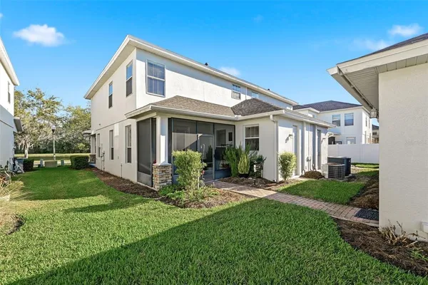 a view of a playground with basketball court