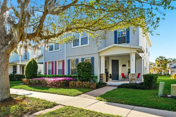 a front view of a house with garden