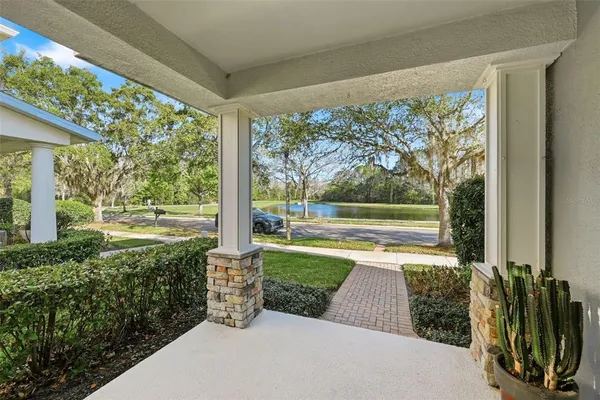 a view of a porch with a yard