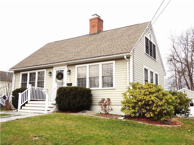 770 Oldfield Road Fairfield, CT 06824 - Photo 1 of 1 a front view of a house with a yard
