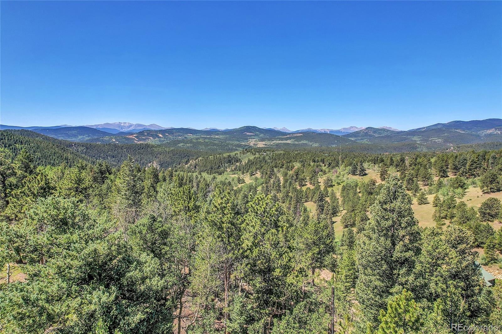 5 Hughesville Road Black Hawk, CO 80422 - Photo 11 of 17 a view of an mountain from a city