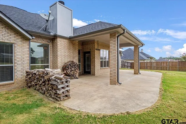 front view of a house with a garden