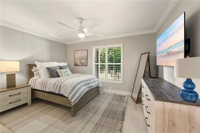 a bathroom with a tub a sink and glass door