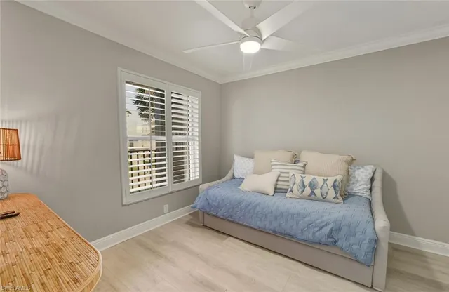 a bathroom with a double vanity sink toilet and shower