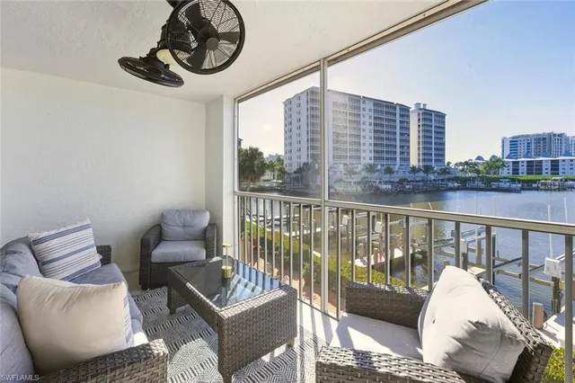 a view of a living room with washer and dryer