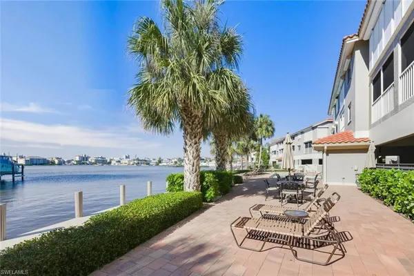 a view of swimming pool outdoor seating
