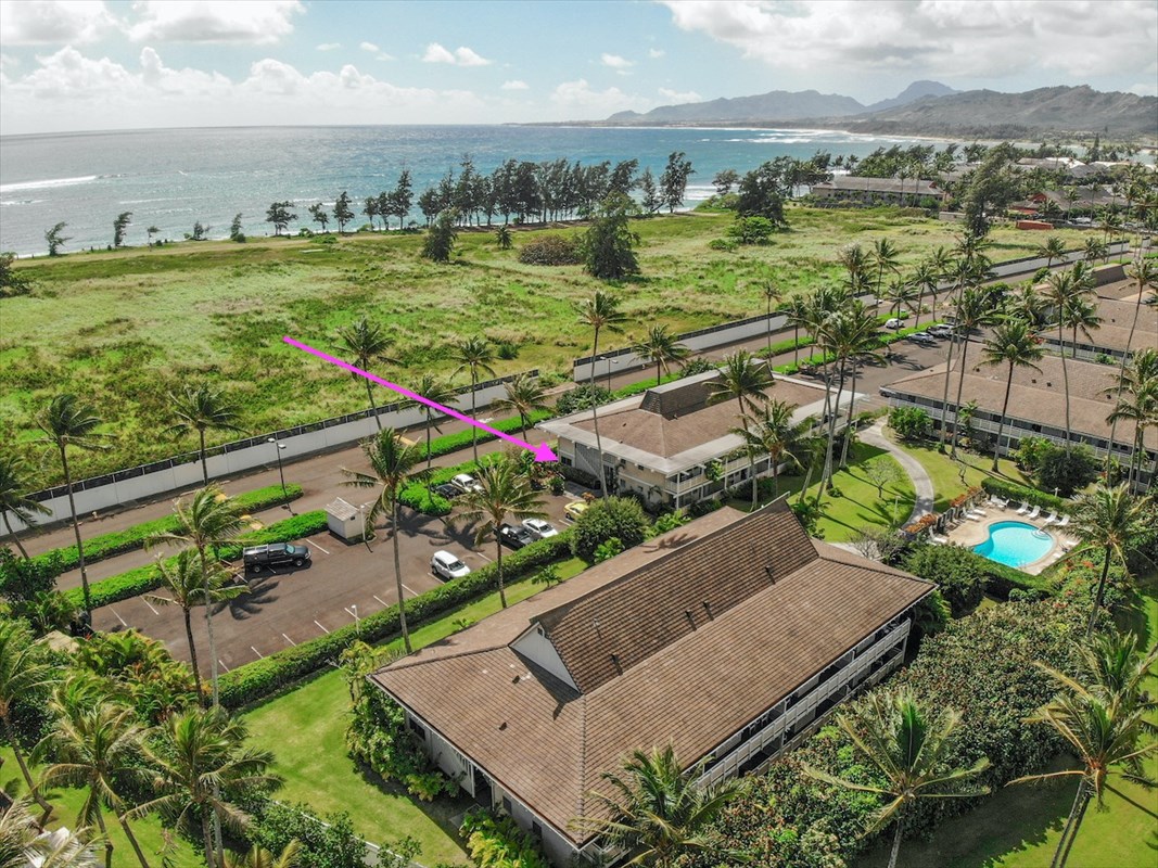 5-25 Aleka Loop, Unit J6 Kapaa, HI 96746 - Photo 13 of 17 an aerial view of a house with a garden and lake view
