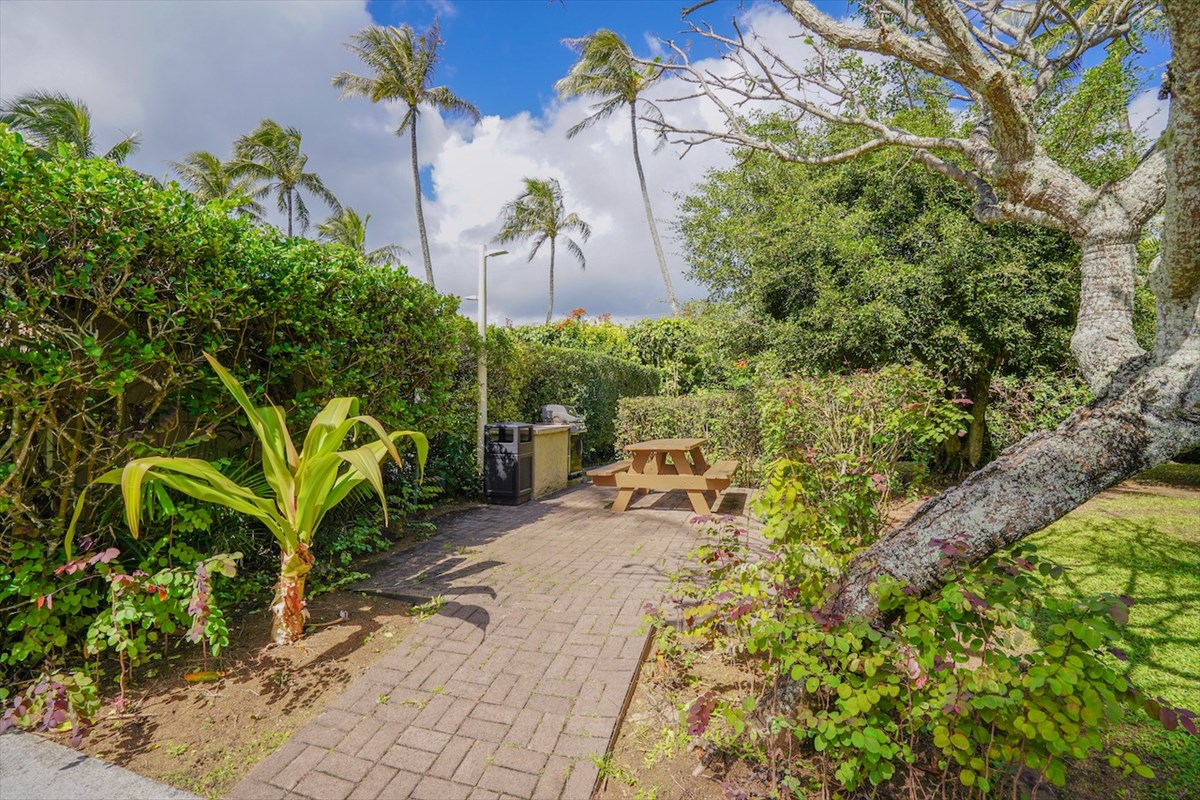 5-25 Aleka Loop, Unit J6 Kapaa, HI 96746 - Photo 14 of 17 a view of a backyard with sitting area