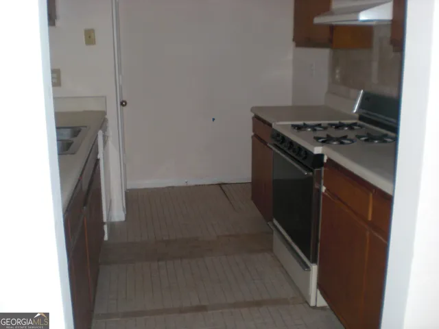 a kitchen with a stove