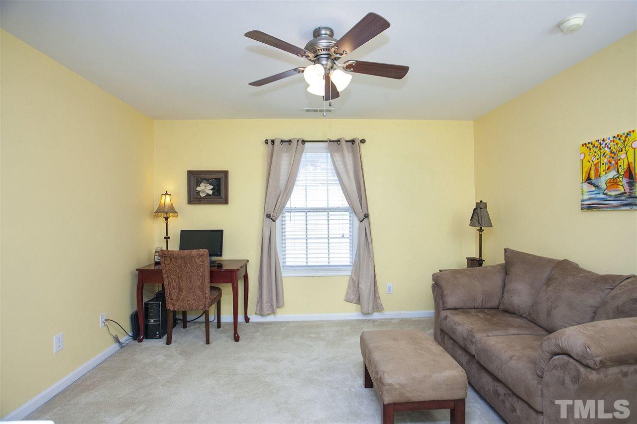 308 Inkster Cove Raleigh, NC 27603 - Photo 17 of 25 a living room with furniture and a window
