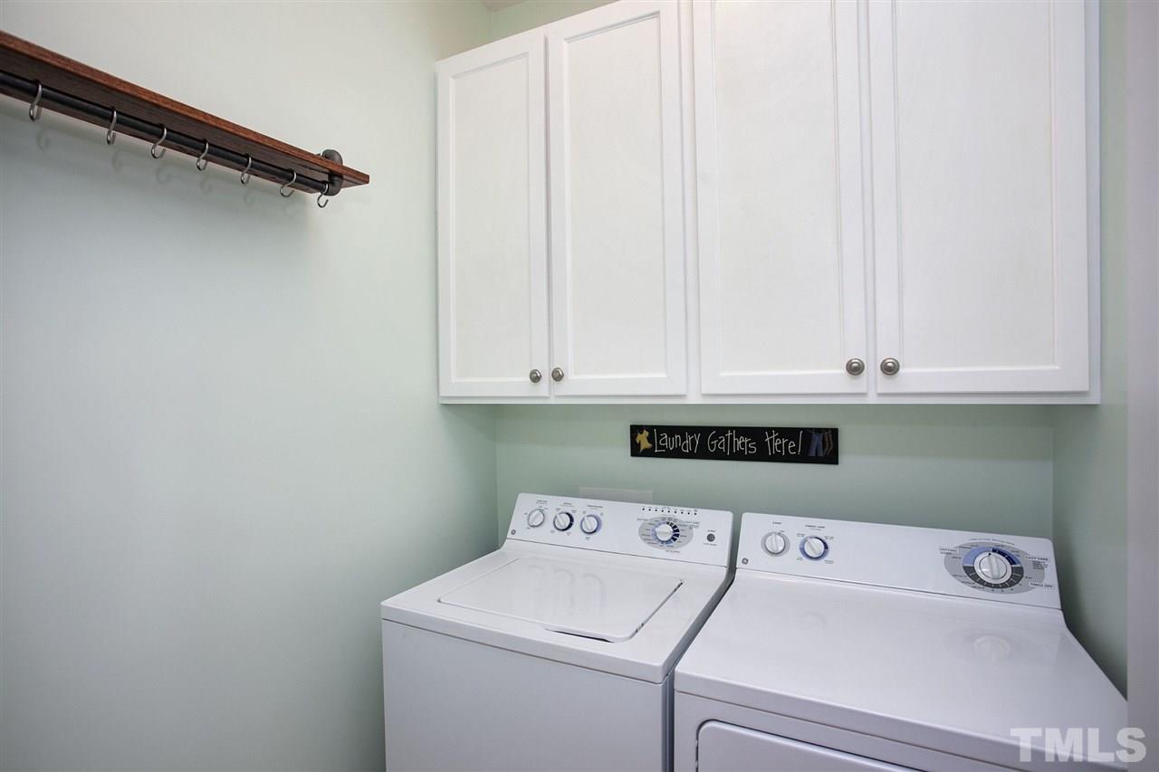 308 Inkster Cove Raleigh, NC 27603 - Photo 20 of 25 a utility room with dryer and washer