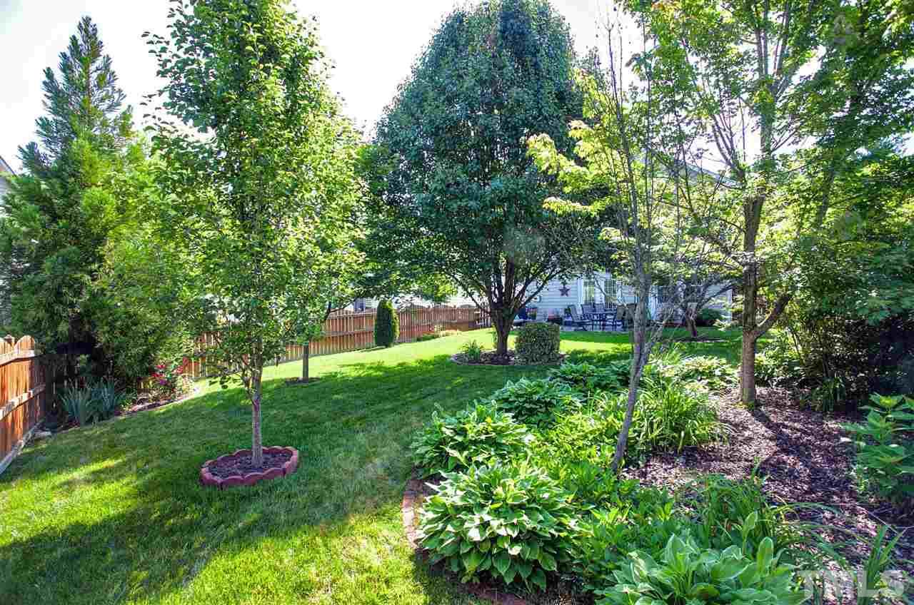 308 Inkster Cove Raleigh, NC 27603 - Photo 24 of 25 a view of a park with large trees