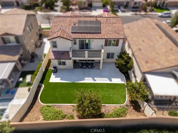 an aerial view of a house with garden