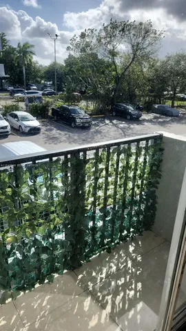 a bathroom with a granite countertop sink a toilet and mirror