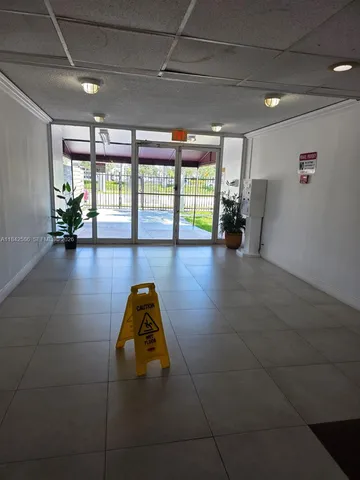 a front view of a building with street view