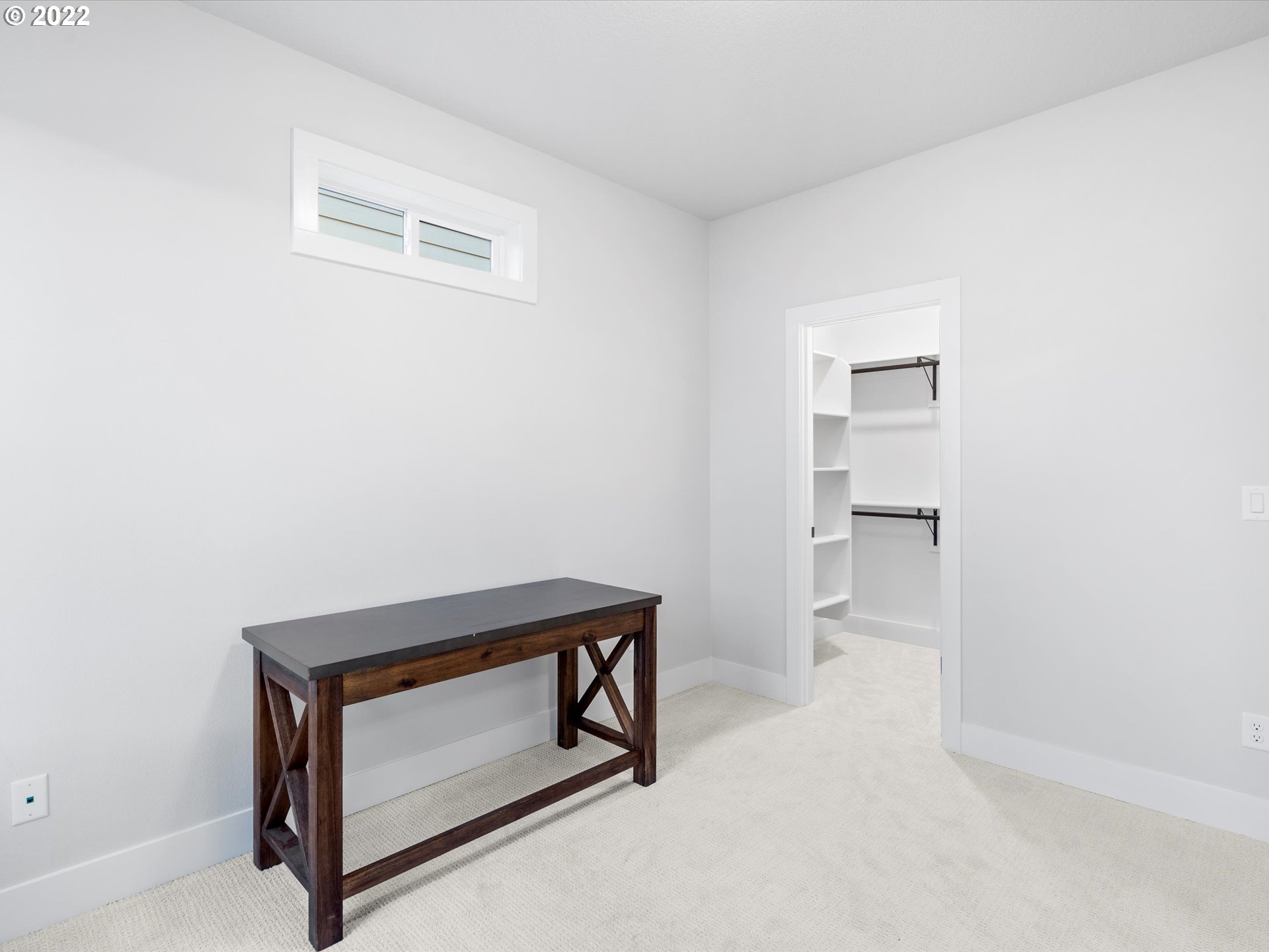 224 North 22nd Court Ridgefield, WA 98642 - Photo 13 of 30 a room with a bench