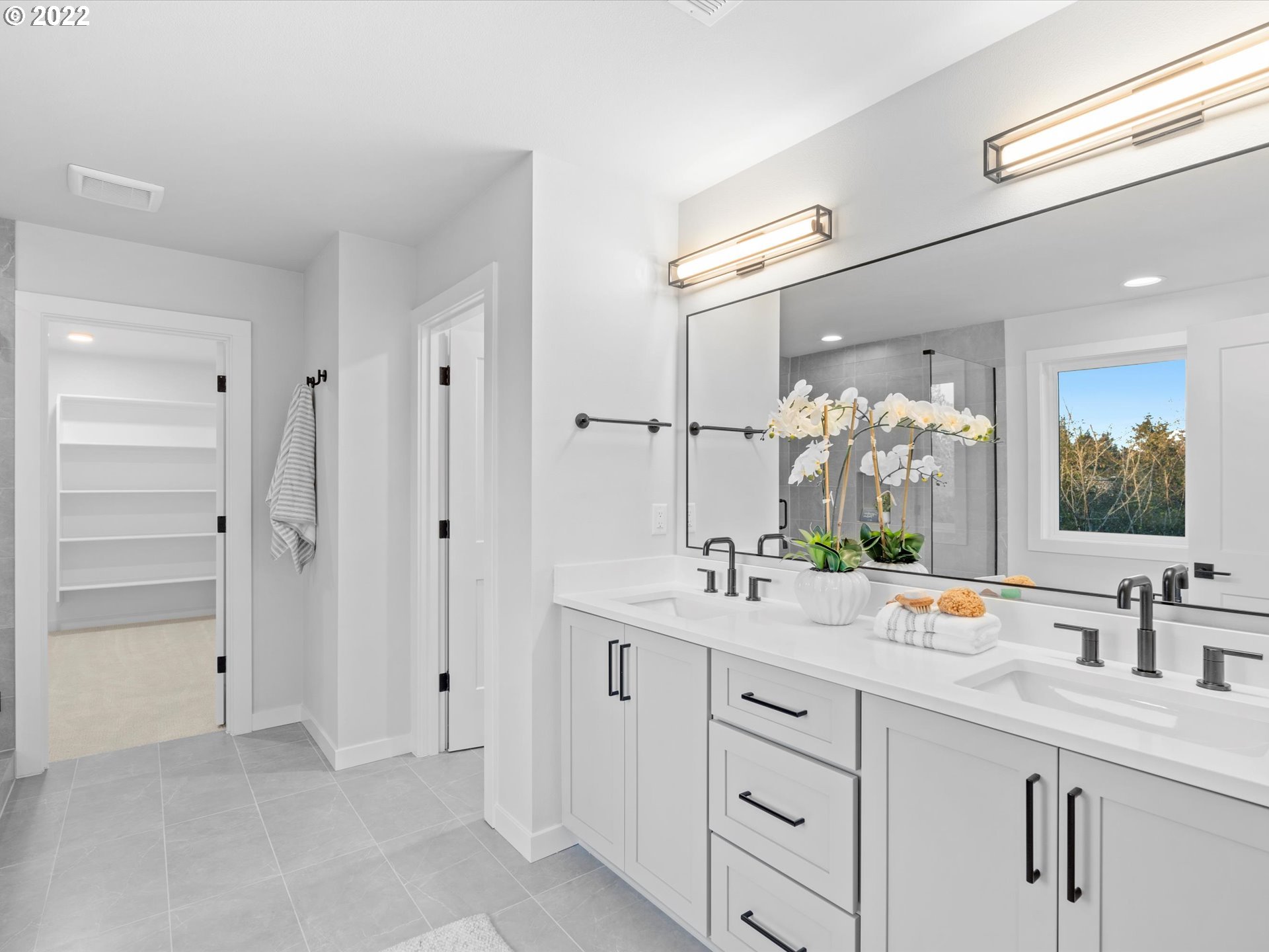 224 North 22nd Court Ridgefield, WA 98642 - Photo 17 of 30 a spacious bathroom with a double vanity sink mirror and double