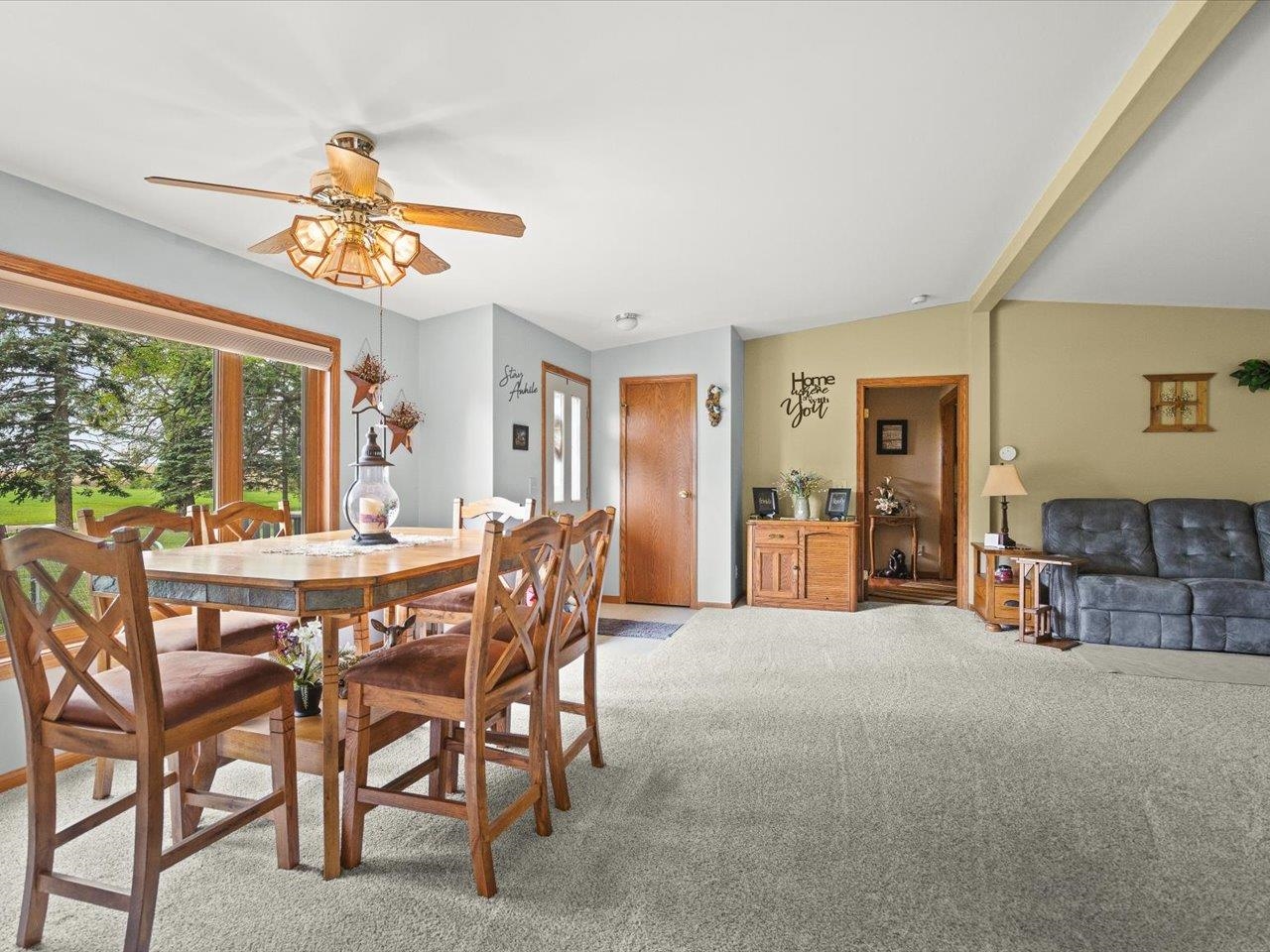 8500 Manchester Road Capron, IL 61012 - Photo 14 of 51 a view of a dining room with furniture window and outside view