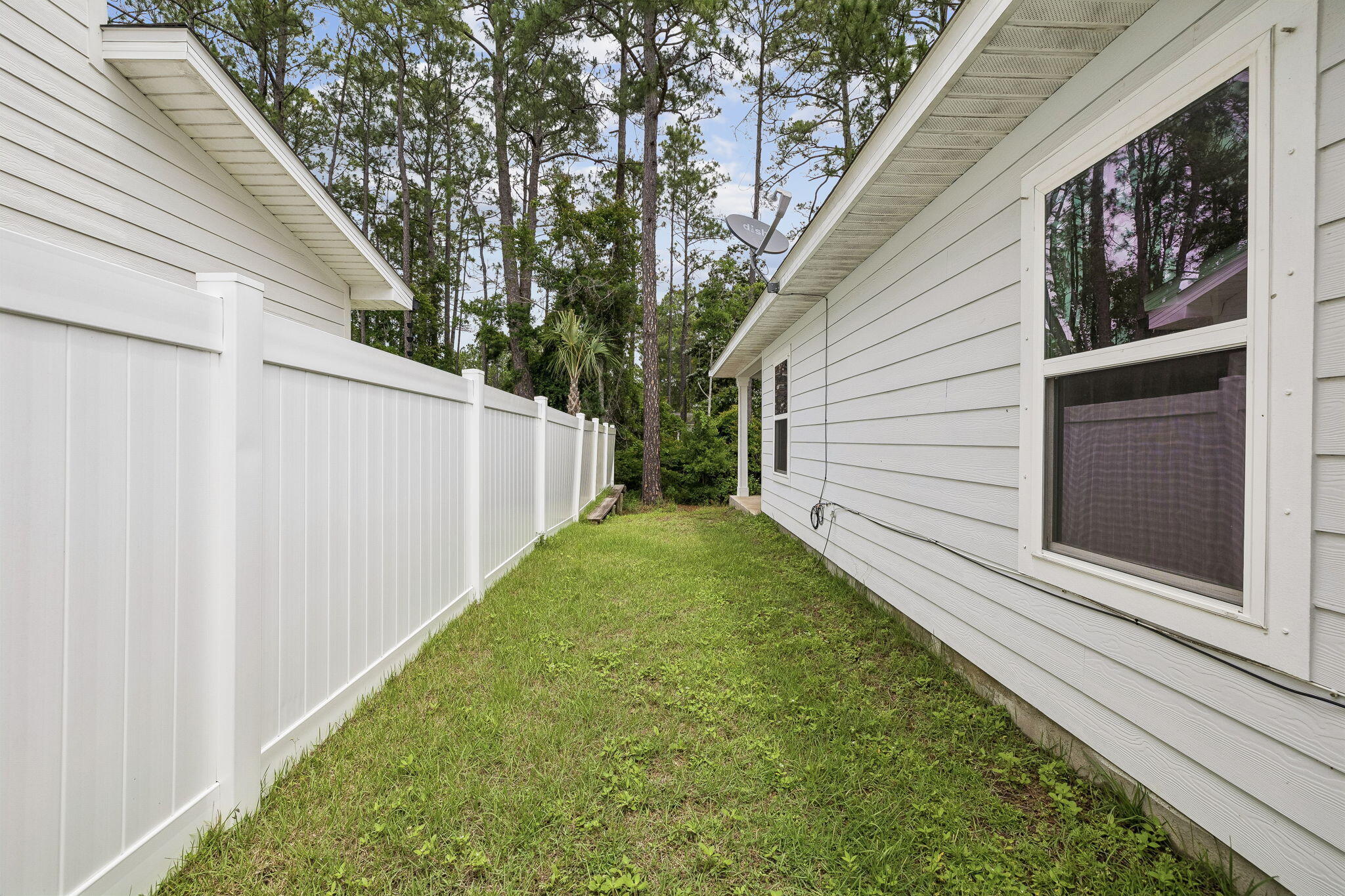 151 Southern Pnes Road, Unit LOT 10 Santa Rosa Beach, FL 32459 - Photo 25 of 35 Side yard