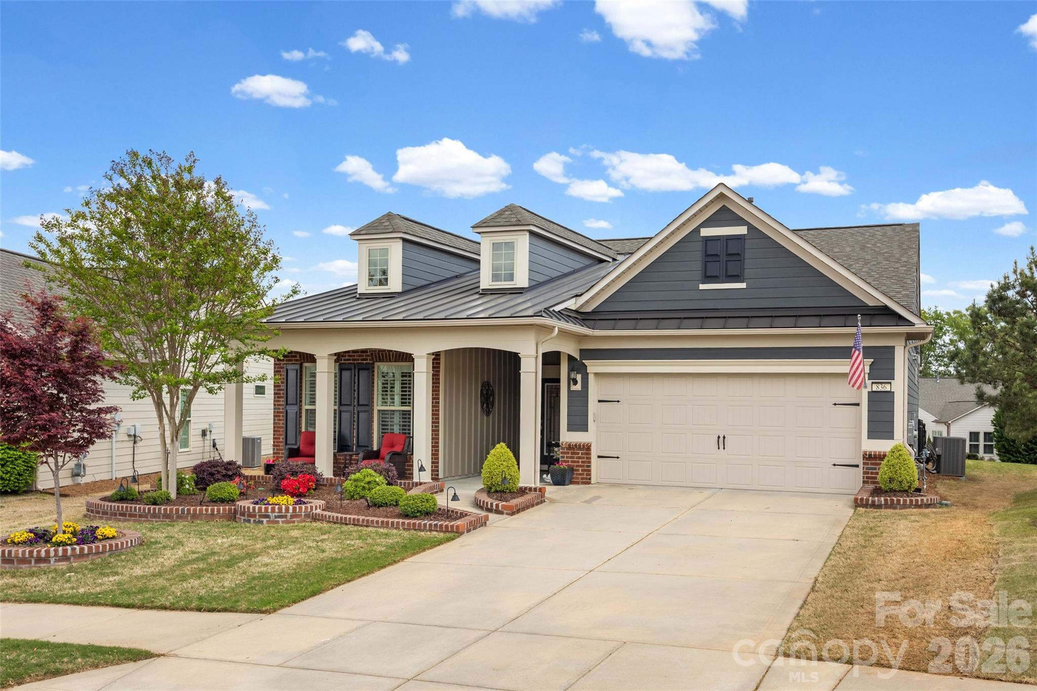 a front view of a house with entertaining space