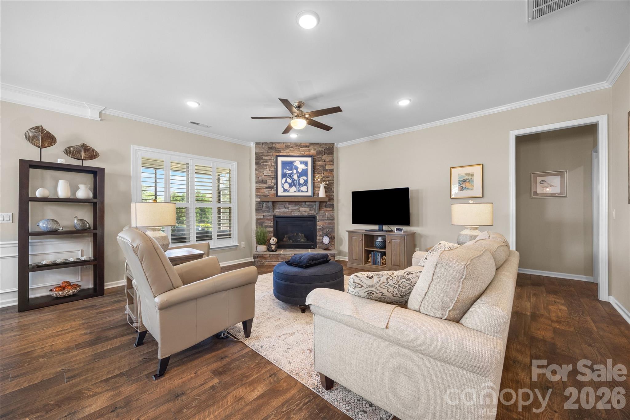836 Bliss Drive Fort Mill, SC 29715 - Photo 16 of 47 a living room with furniture and a flat screen tv