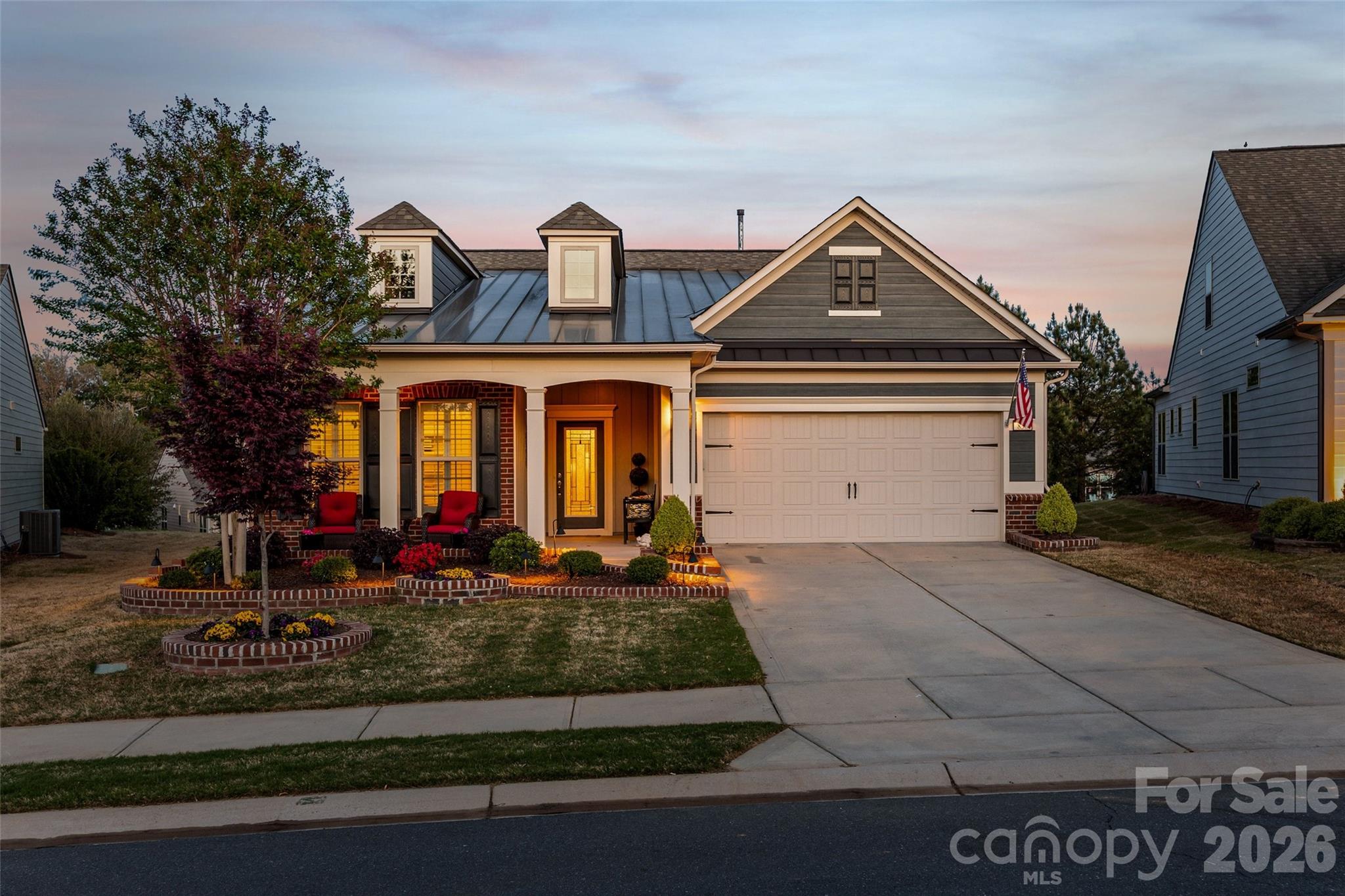836 Bliss Drive Fort Mill, SC 29715 - Photo 2 of 47 a front view of a house with garden