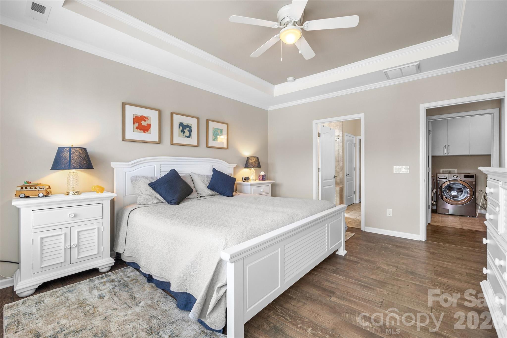 836 Bliss Drive Fort Mill, SC 29715 - Photo 23 of 47 a bed room with a bed and a chandelier