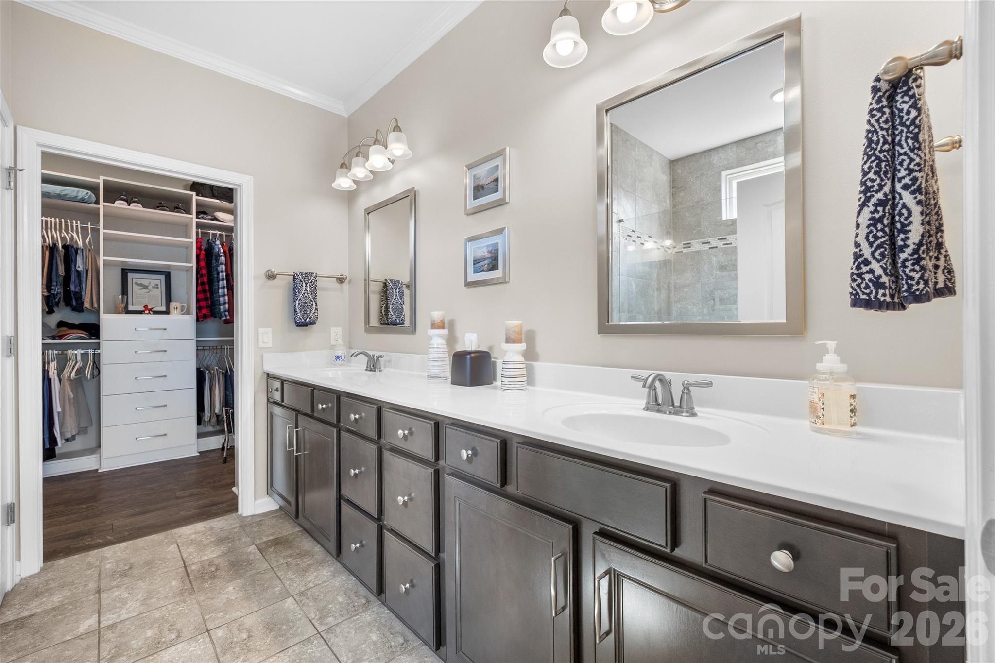 836 Bliss Drive Fort Mill, SC 29715 - Photo 24 of 47 a spacious bathroom with a double vanity sink a and mirror